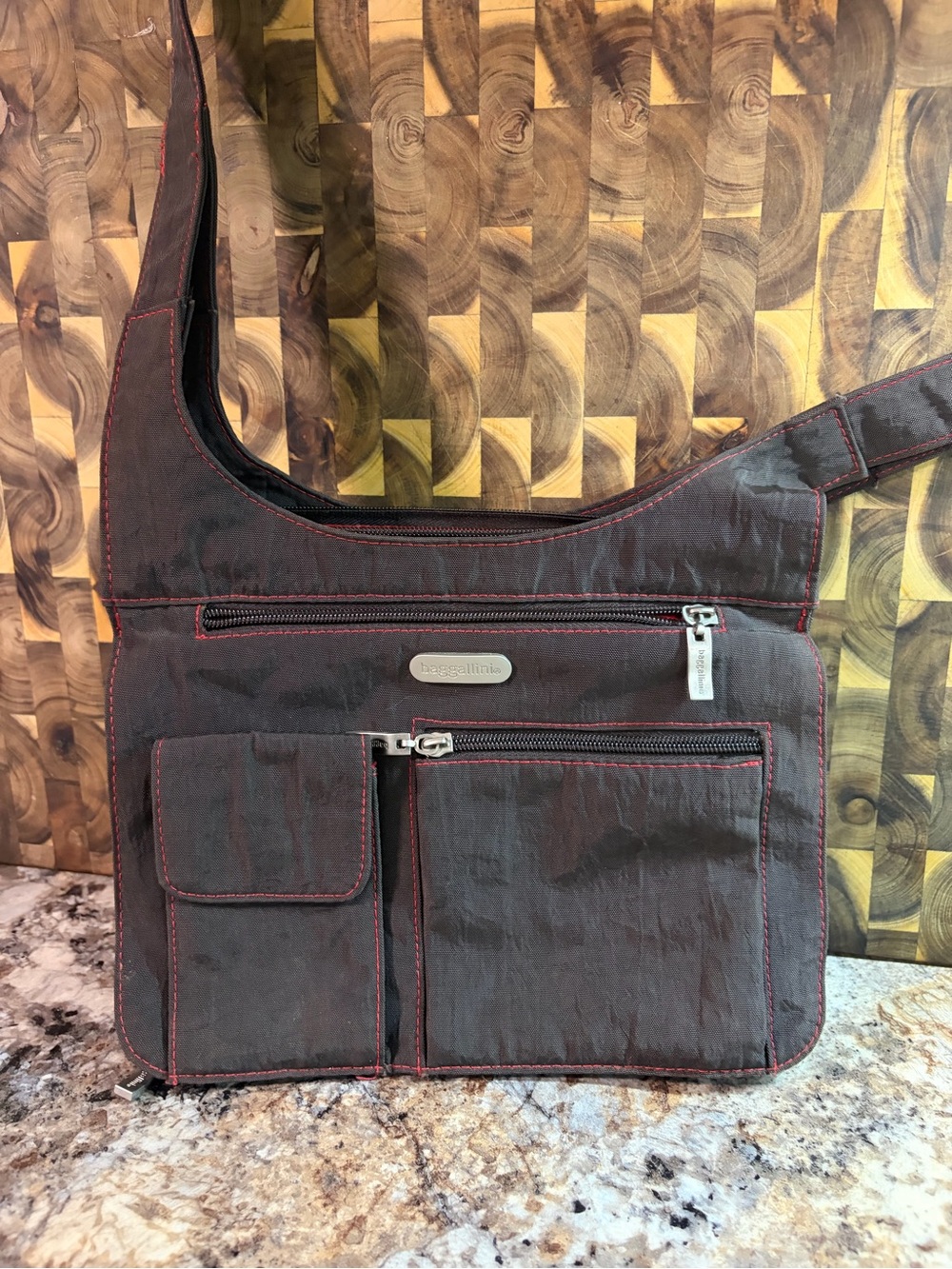 Baggallini Dark Gray Messenger Bag with Red Stitching